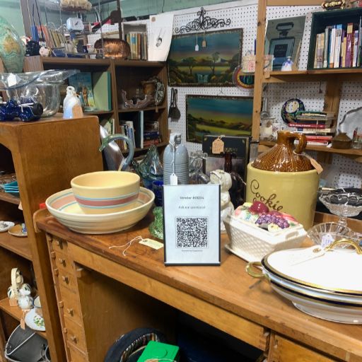 Vintage shop booth display with Chataboom chat QR code