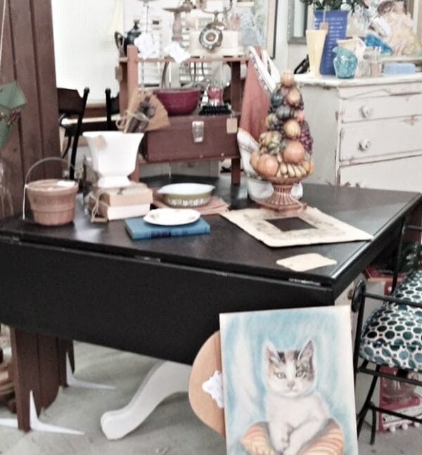 Customer photo of an antique table in the booth